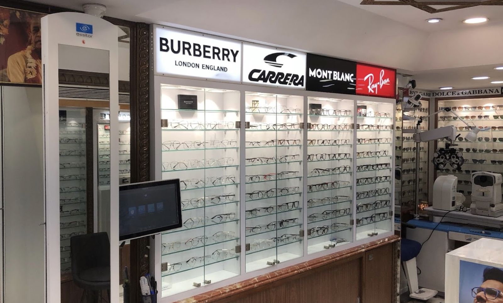 Designer eyewear brand walls inside Khanna Vision optical shop in Jaipur